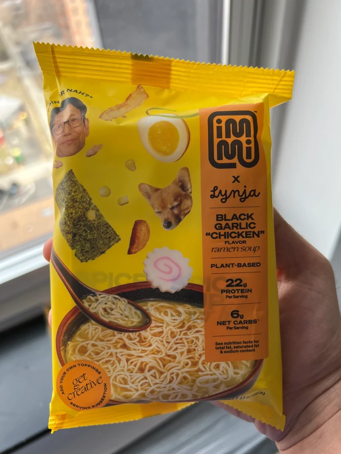 Limited-edition yellow immi × Lynja Black Garlic Chicken ramen packaging